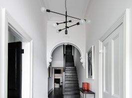 Curved ornate doorways with black floors