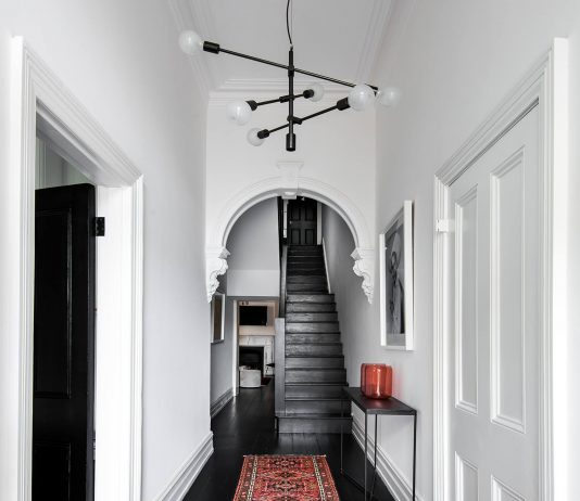 Curved ornate doorways with black floors