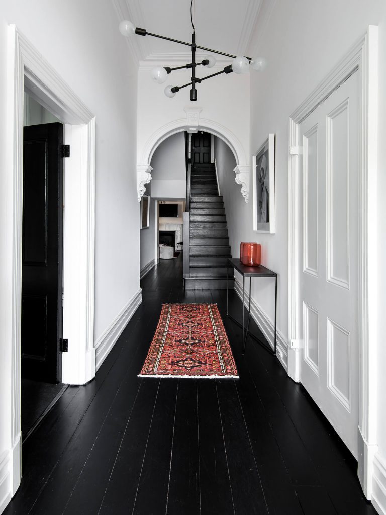 Curved ornate doorways with black floors