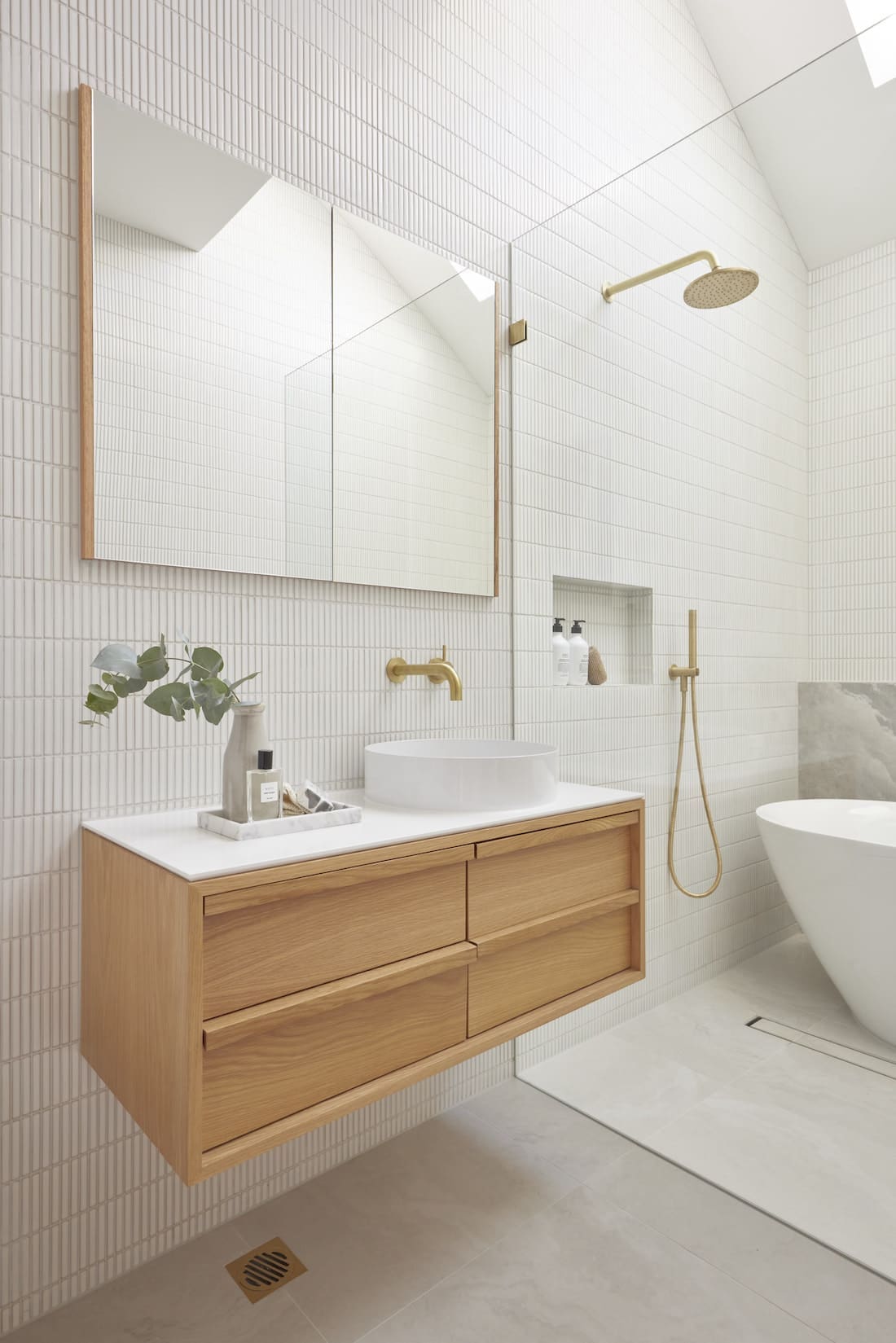 Floating timber vanity in white bathroom