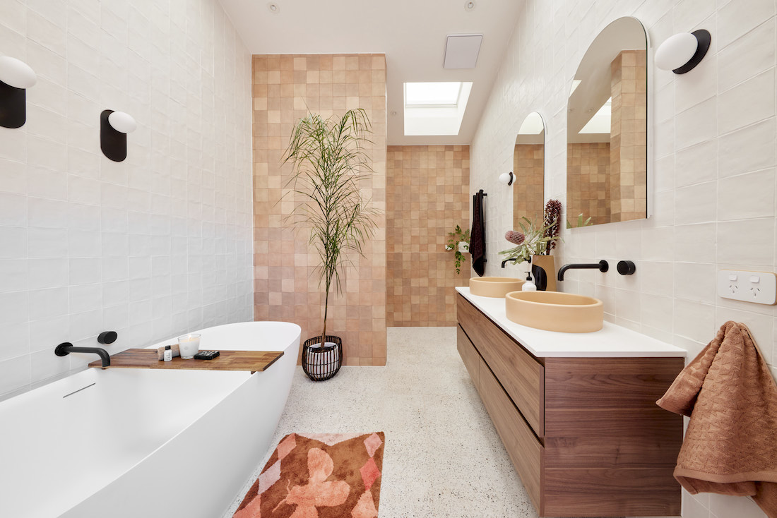Moroccan feel bathroom with timber vanity and brown mosaic feature wall