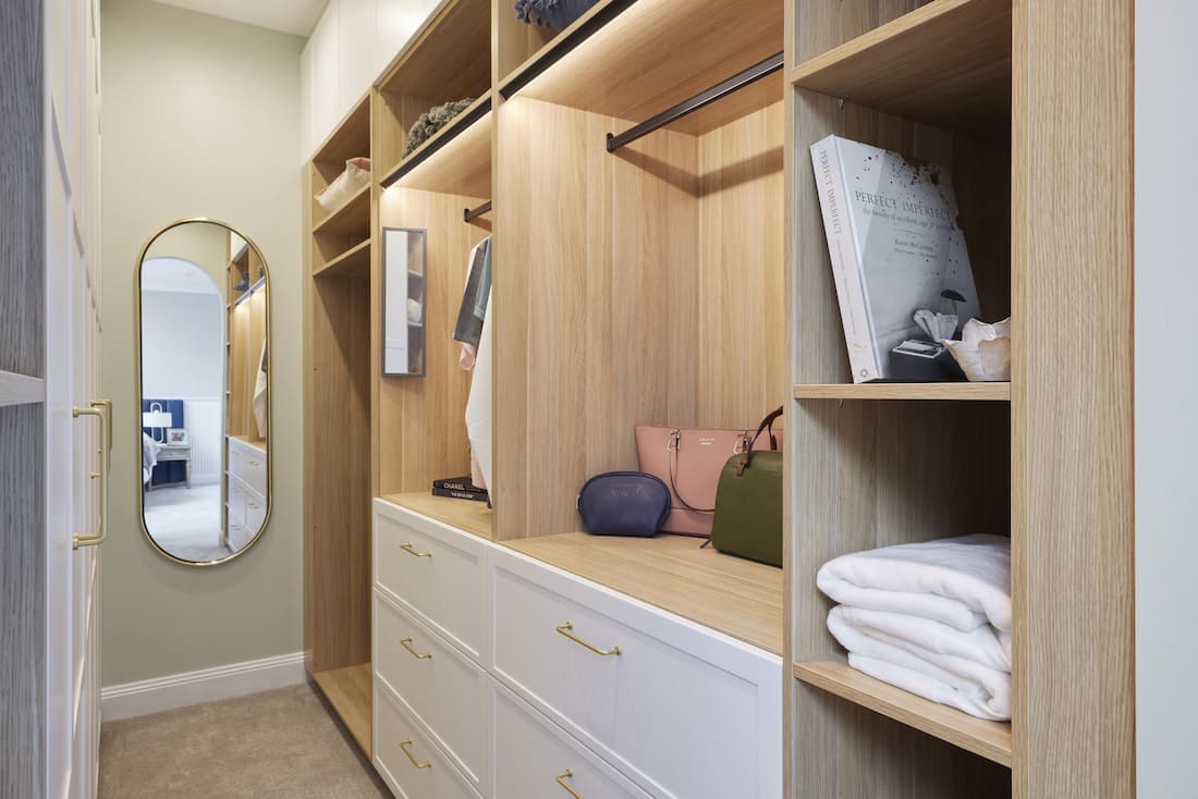 Timber panelled walk in wardrobe shelving