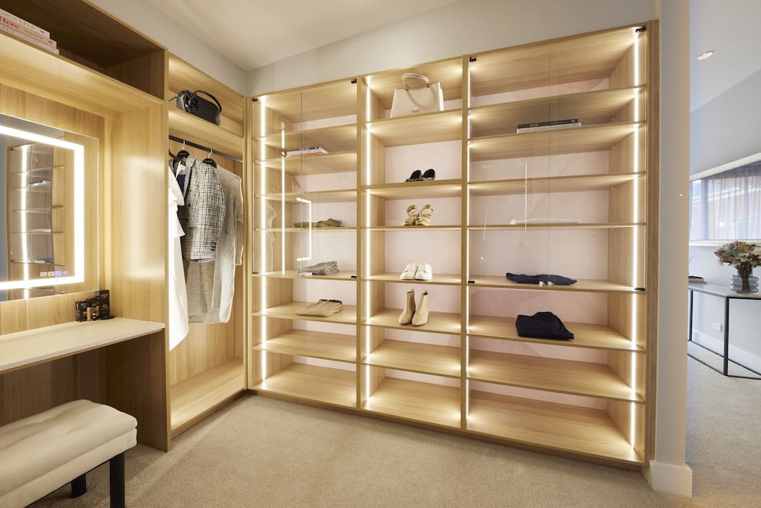 Master walk-in wardrobe with back lit shelving