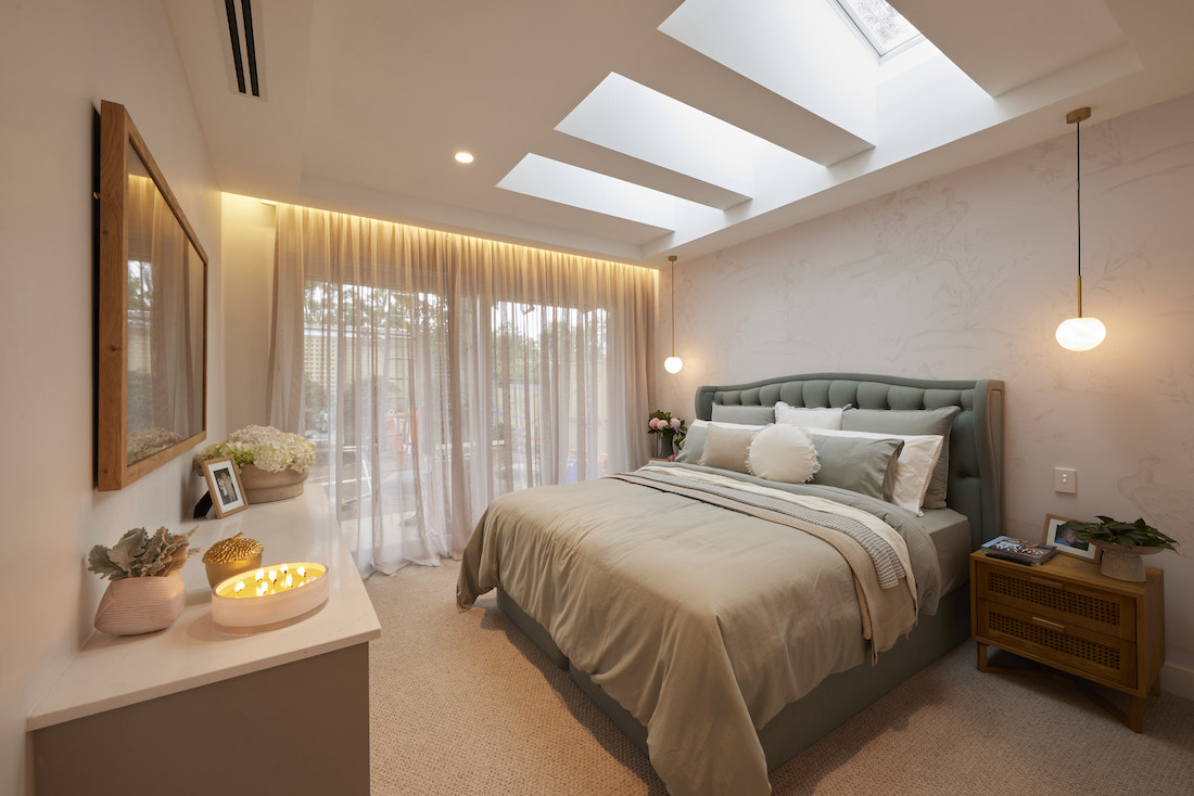Sophisticated bedroom with mood lighting and skylights