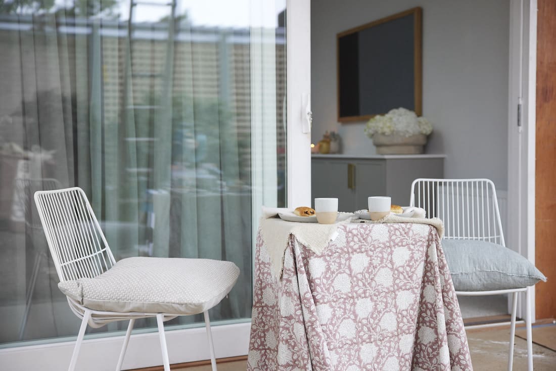 Outdoor patio space with table and chairs