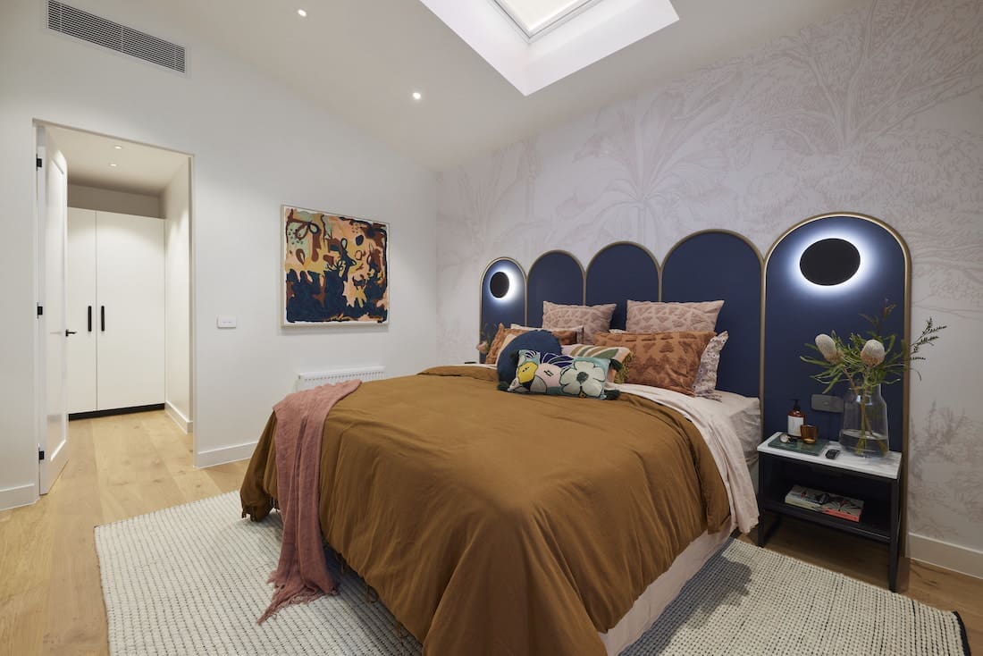 Scalloped headboard in master bedroom