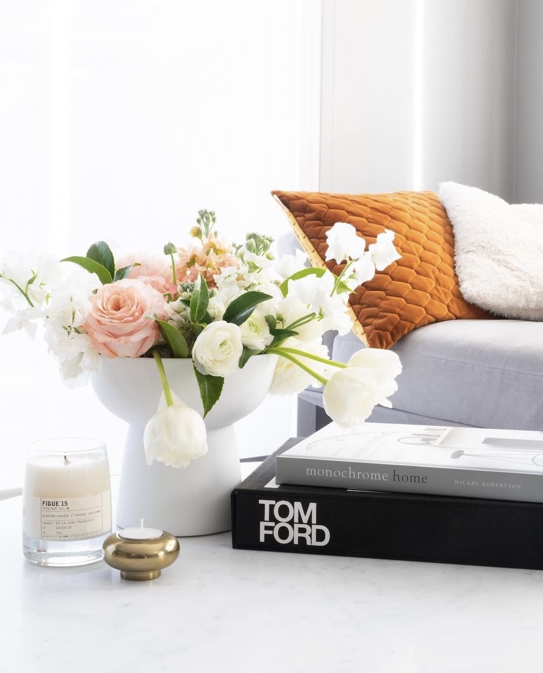 coffee table vignette with tom ford coffee table book