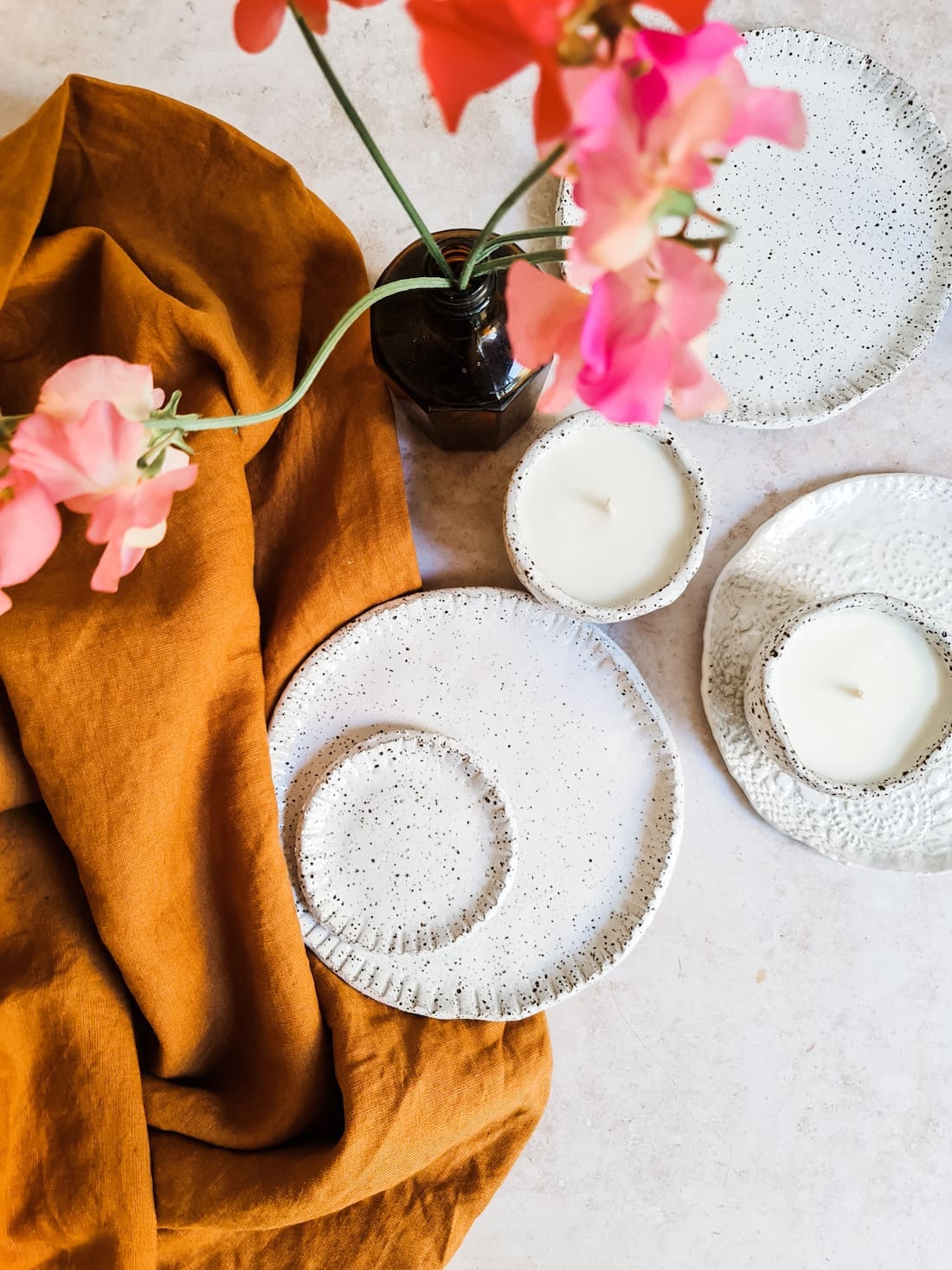 The Seasonal Ceramicist_plates and candles_imperfect textural designs