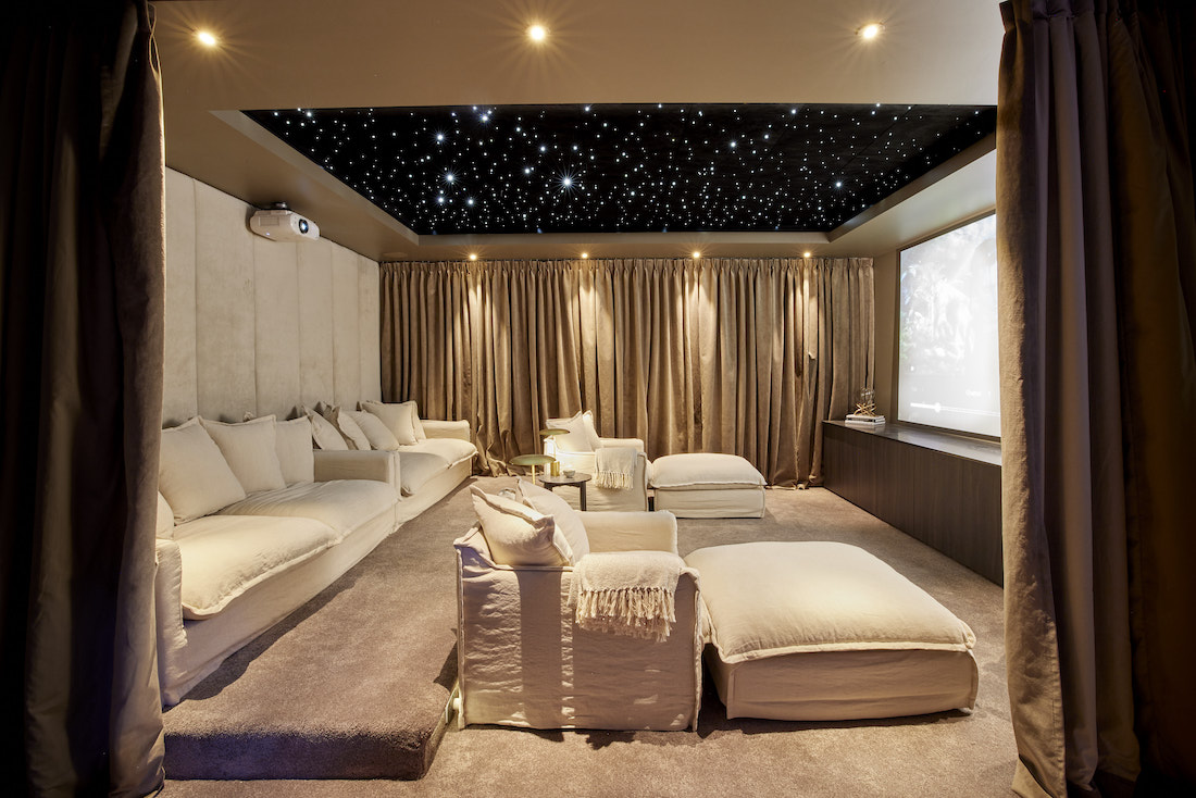 At home cinema set up in basement is the ultimate media room