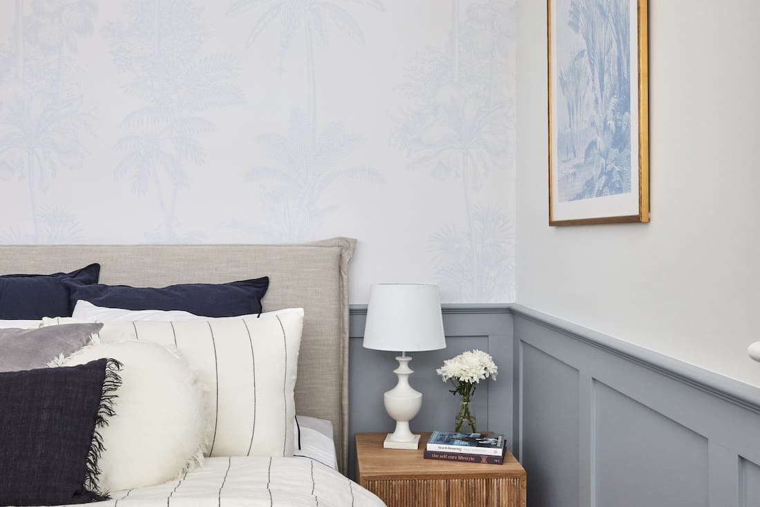 Blue wainscot trim on wall