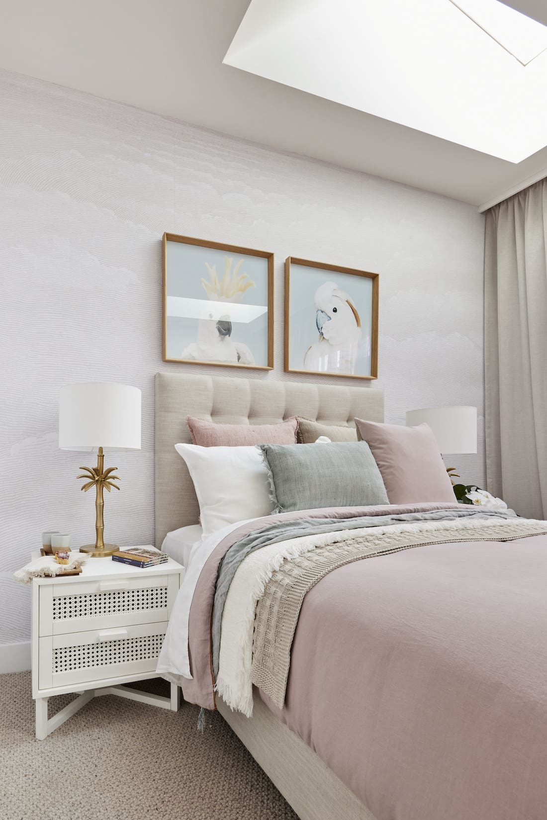 Guest bedroom in blush and sage tones