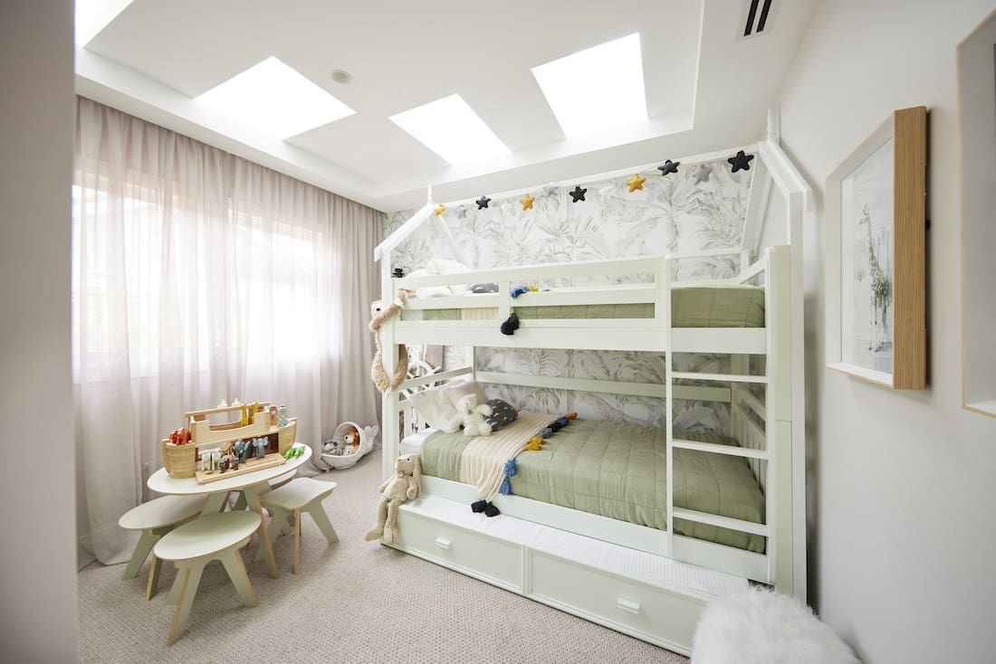 Kids bedroom with skylights and bunk beds