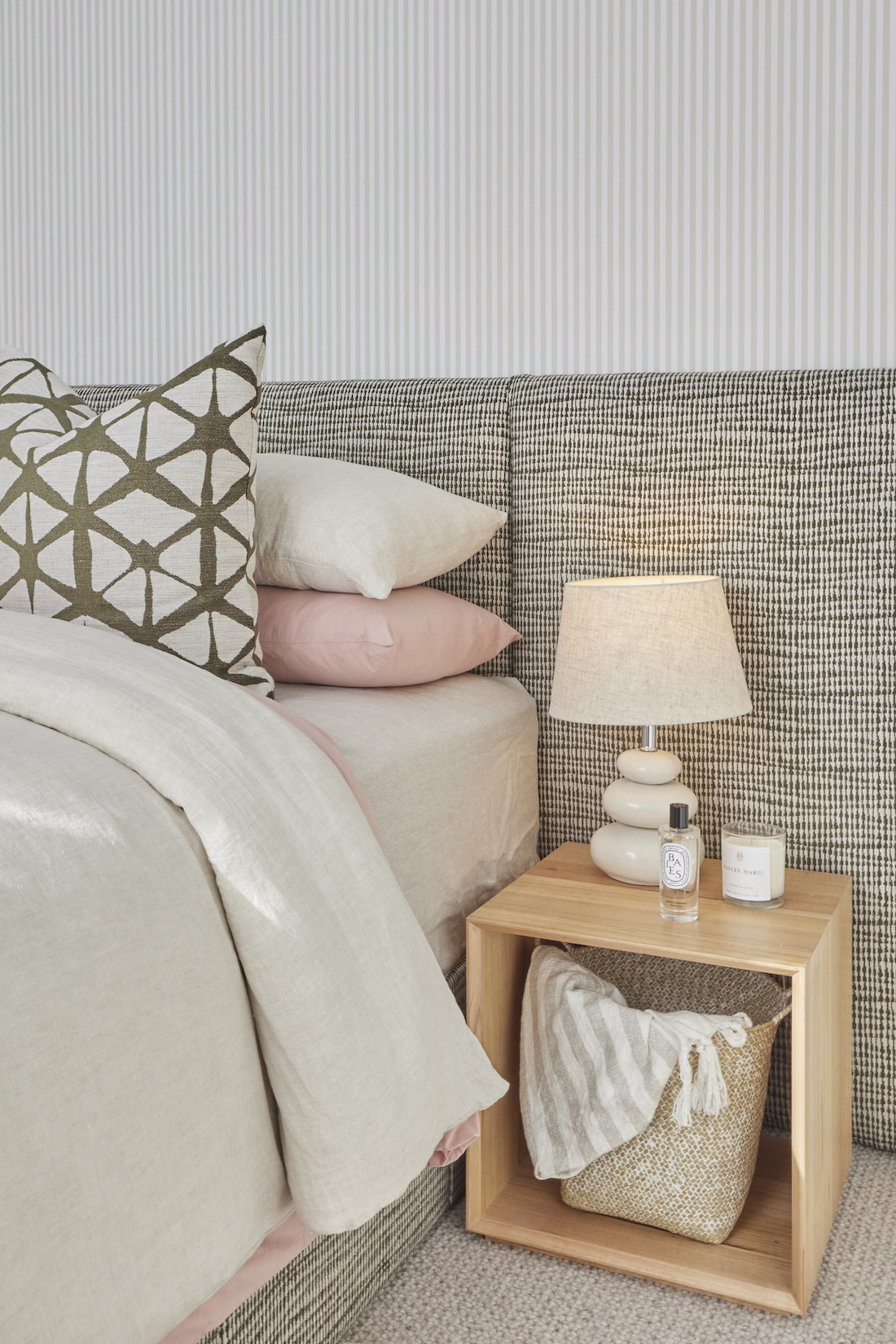 Fabric bedhead with geometric print cushion