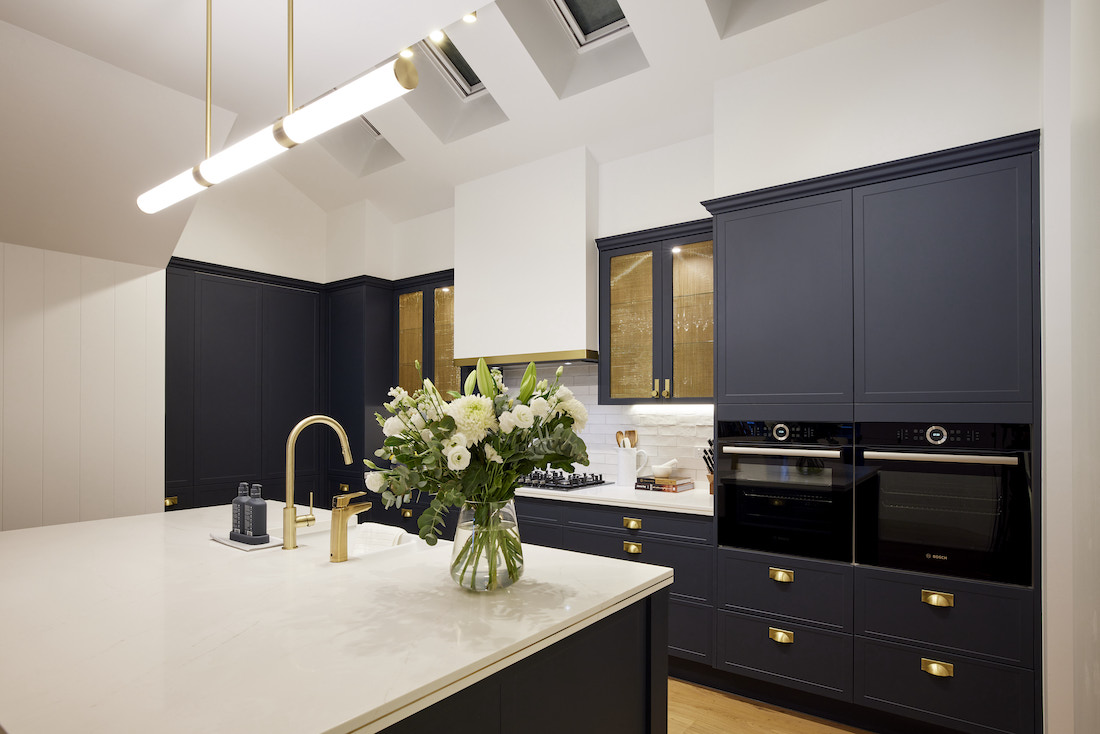 Navy and brass Hamptons style kitchen