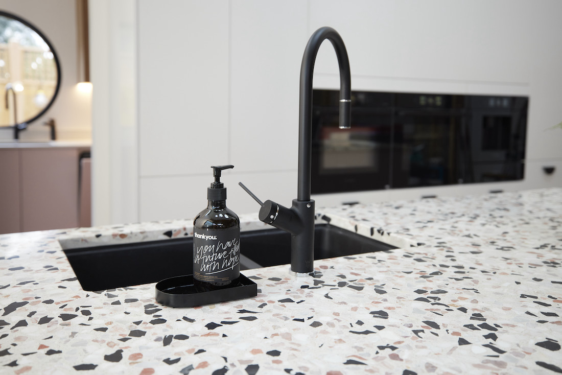 Terrazzo benchtops with black tap and sink