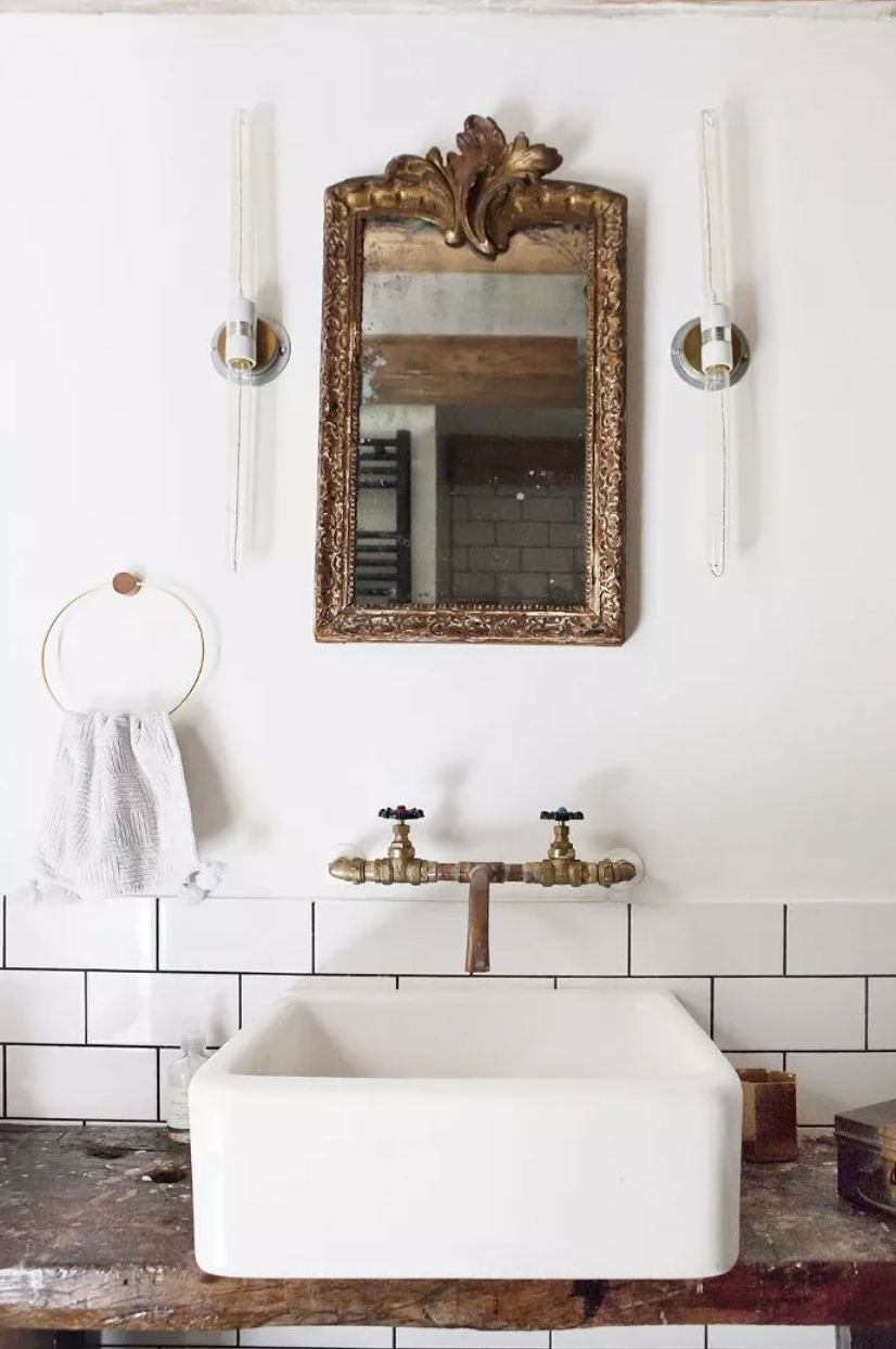 Vintage mirror with farmhouse sink