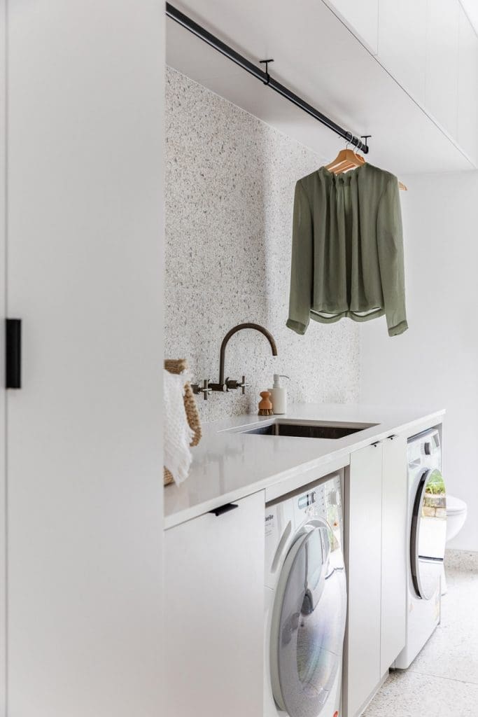 Tonal terrazzo laundry: Modern laundry renovation with a retro twist ...