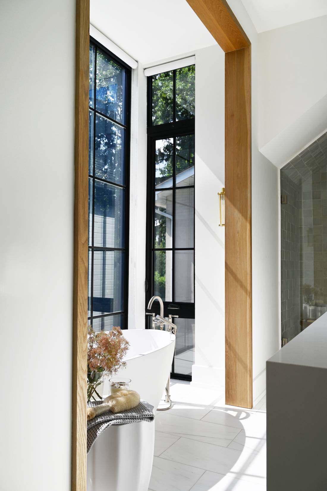 Glass window with freestanding bath