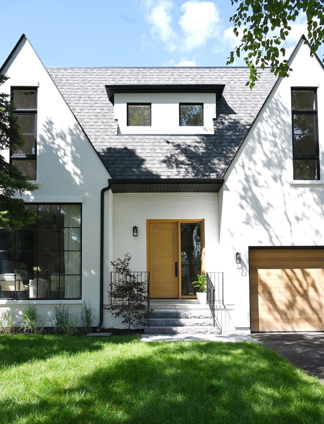 Exterior of home with peaked roof