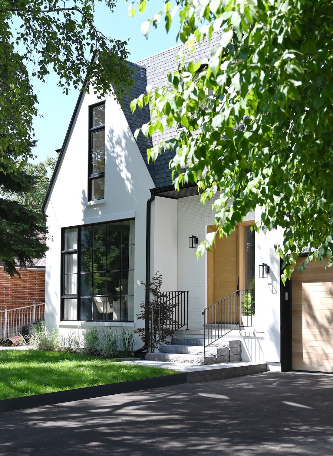 Exterior of home with peaked roof