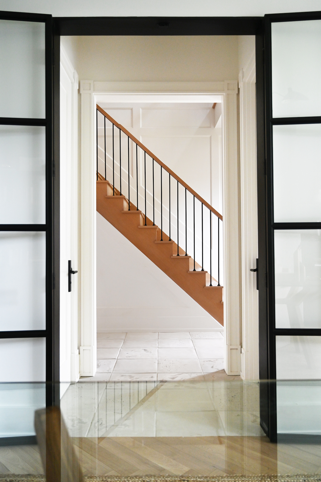 Black framed doors to staircase