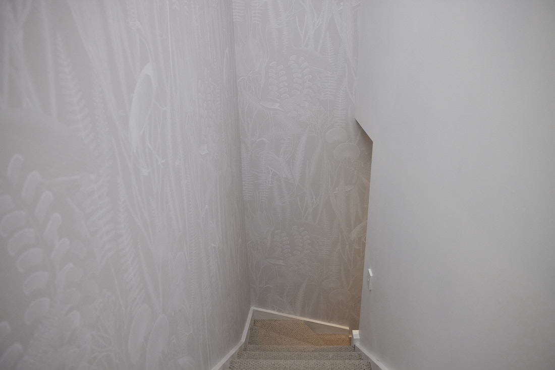 Floor to ceiling wall paper staircase