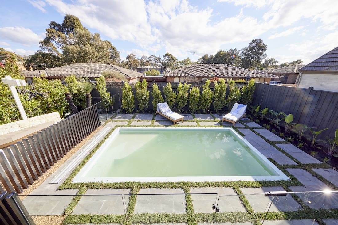 Pool with sun loungers