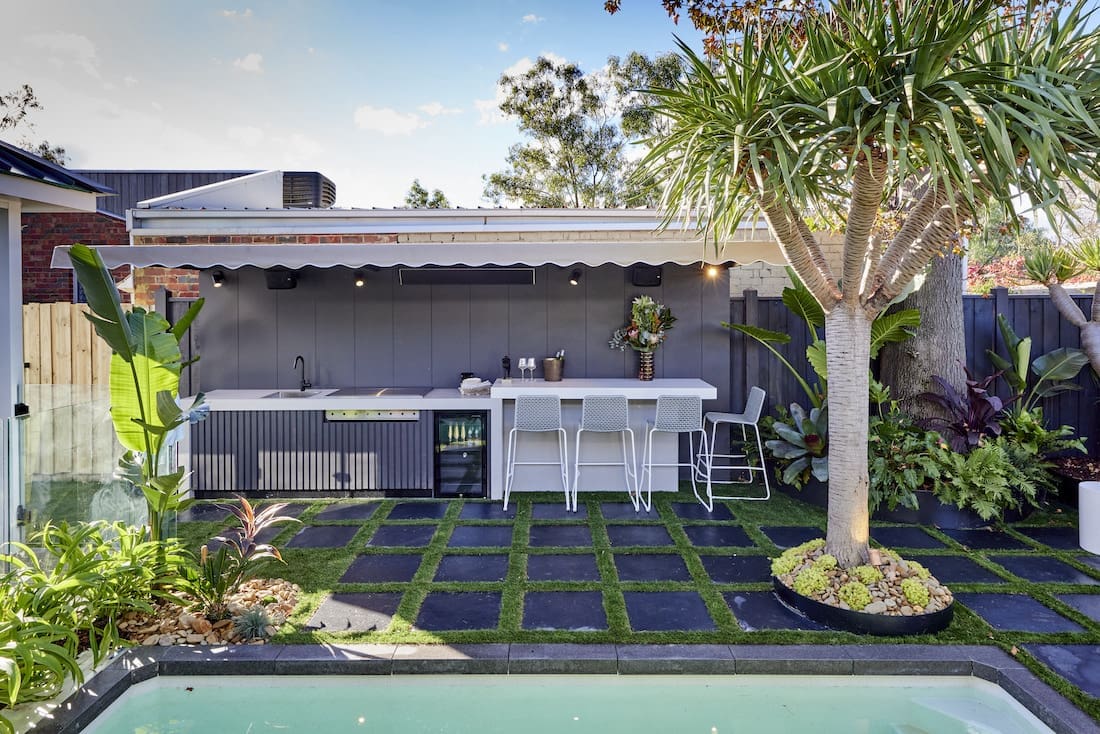 Covered outdoor kitchen and bar space