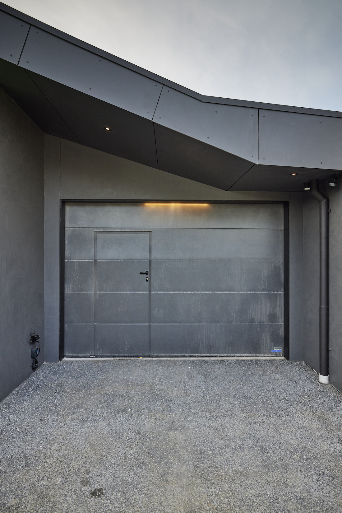 Single garage with a door within a door