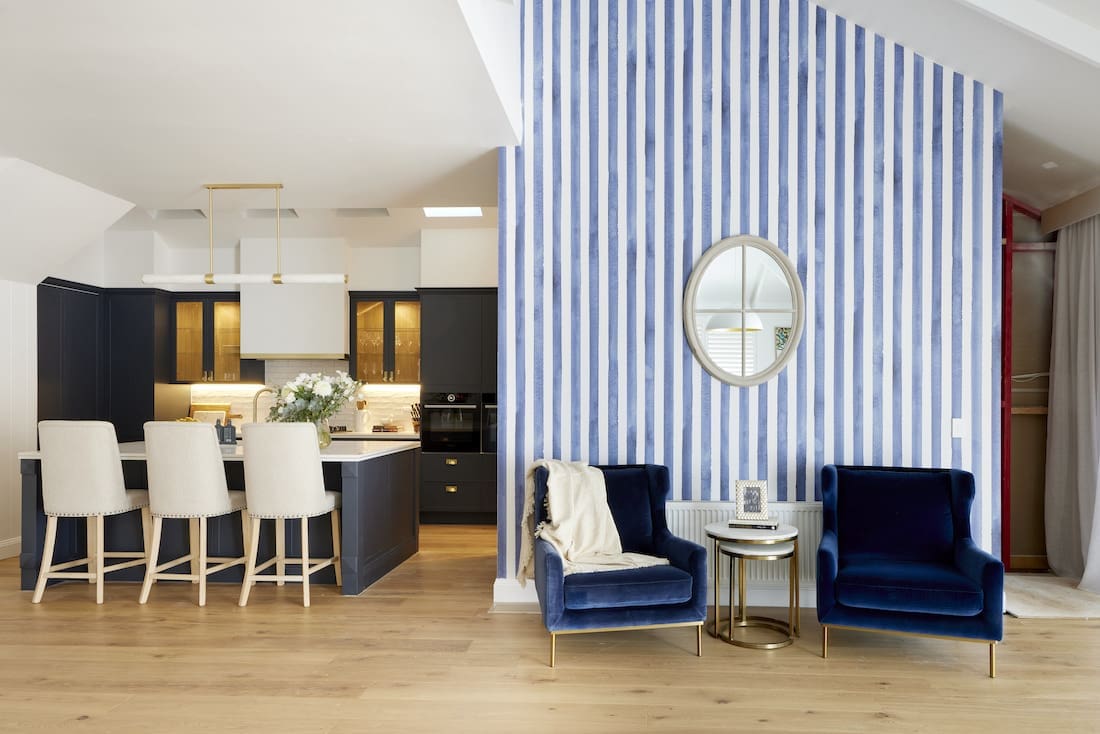 Blue striped feature wall seating nook by kitchen