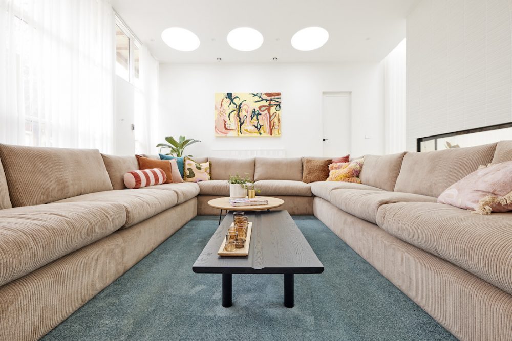 Sunken lounge with blue carpet