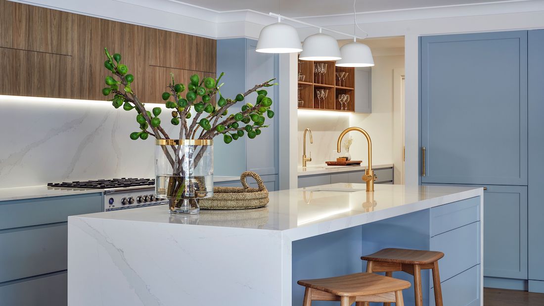 Blue Hamptons kitchen with view to butlers pantry