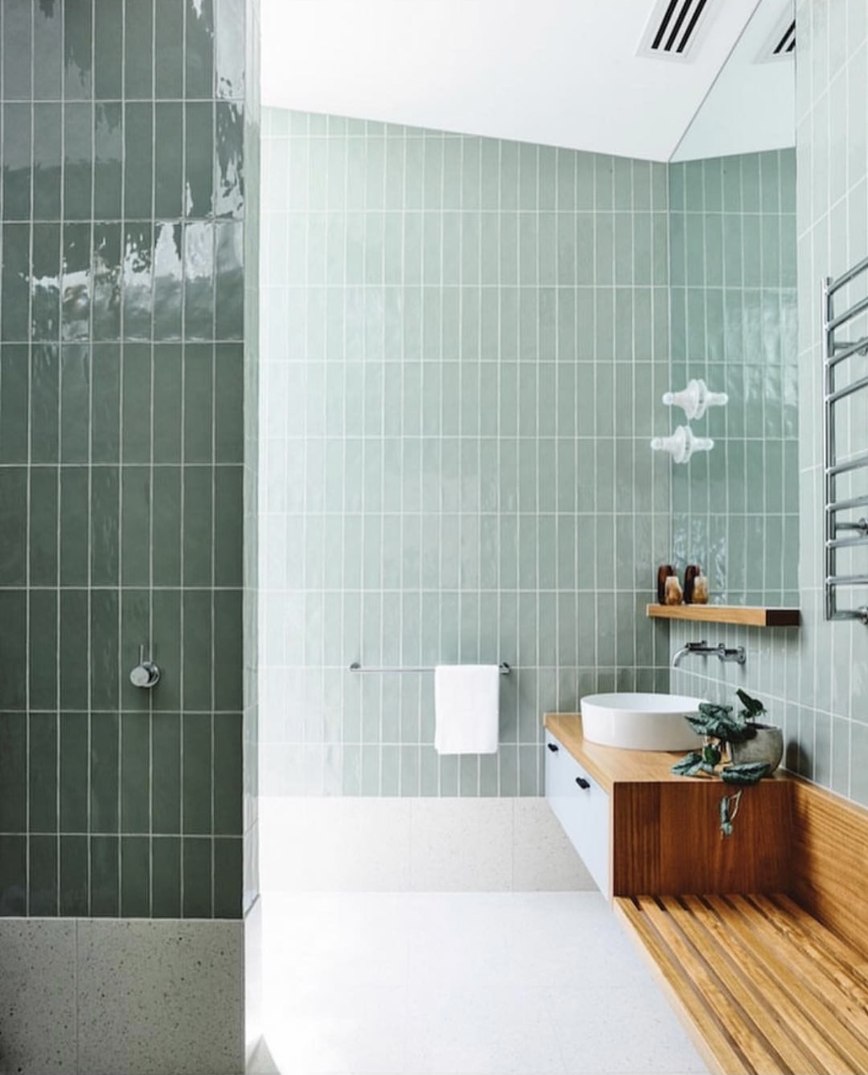 Green subway tile bathroom