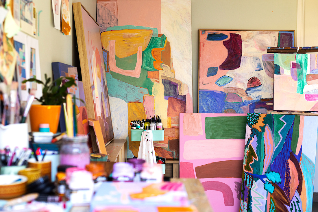 Collection of colourful artworks in art studio by Jackie Anderson