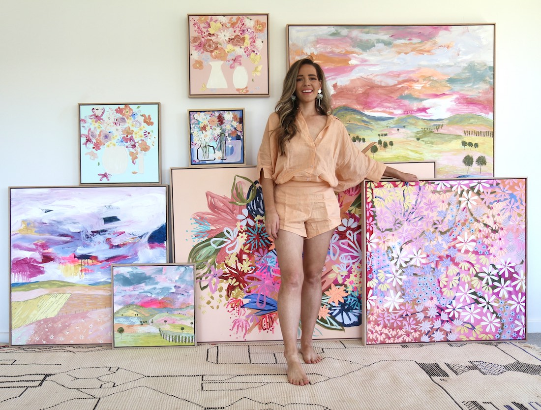 Artist Kelsie Rose from Kelsie Rose Creative with collection of art