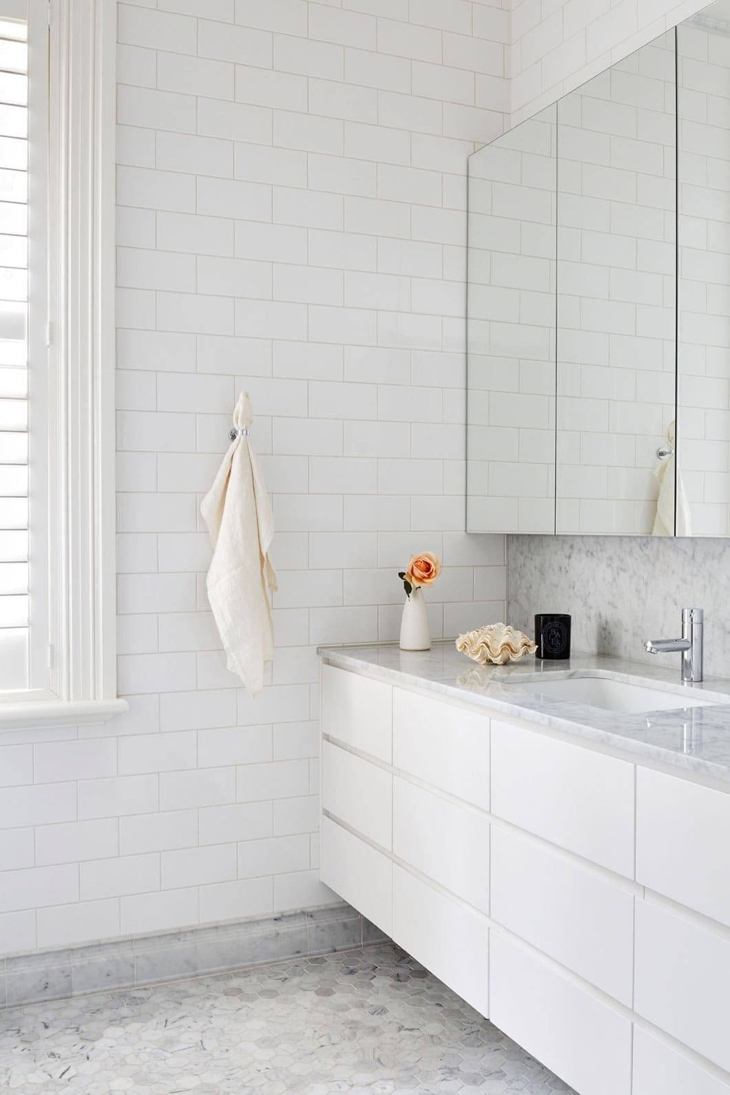 White modern bathroom in heritage home