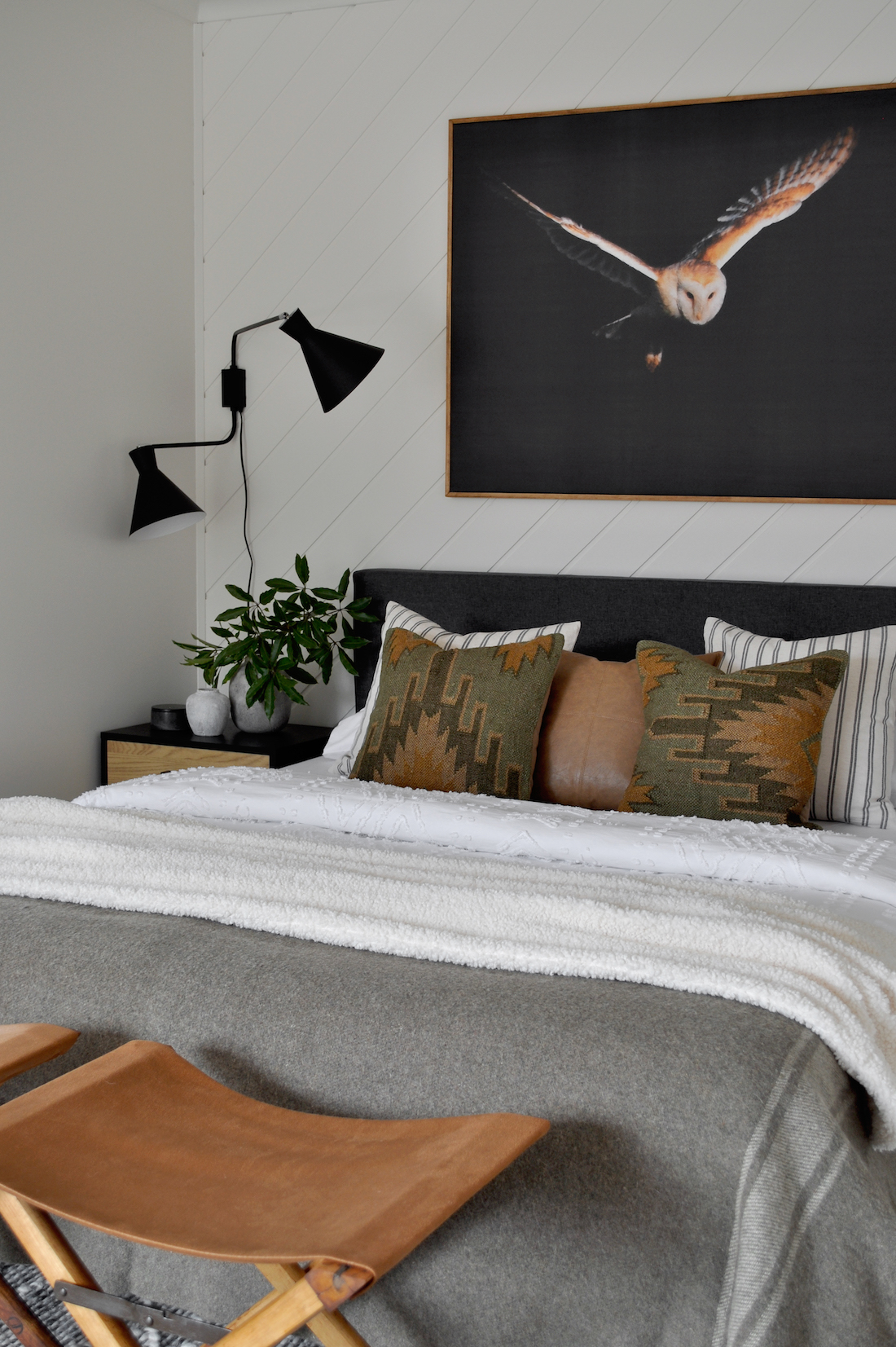 Kilim cushions in masculine bedroom