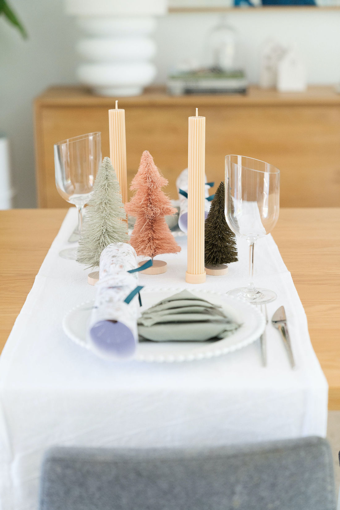 Pillar candles on table setting