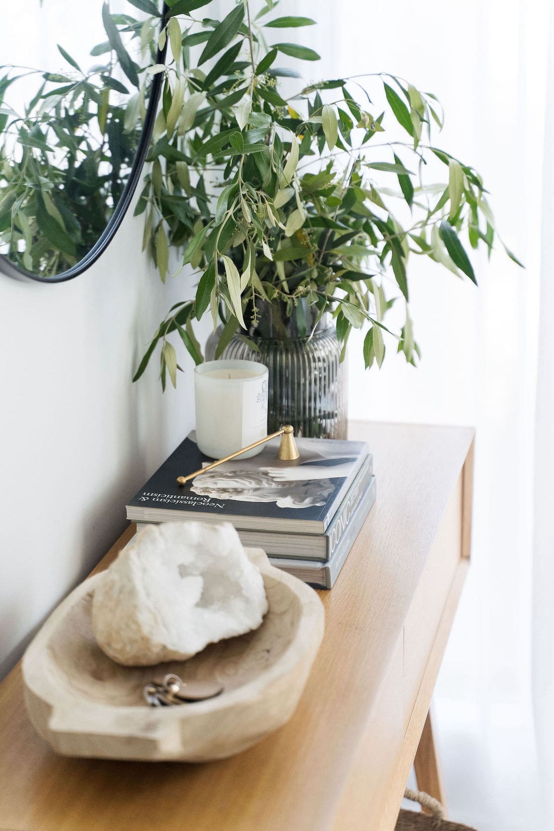 Entry styling with timber bowl and crystal