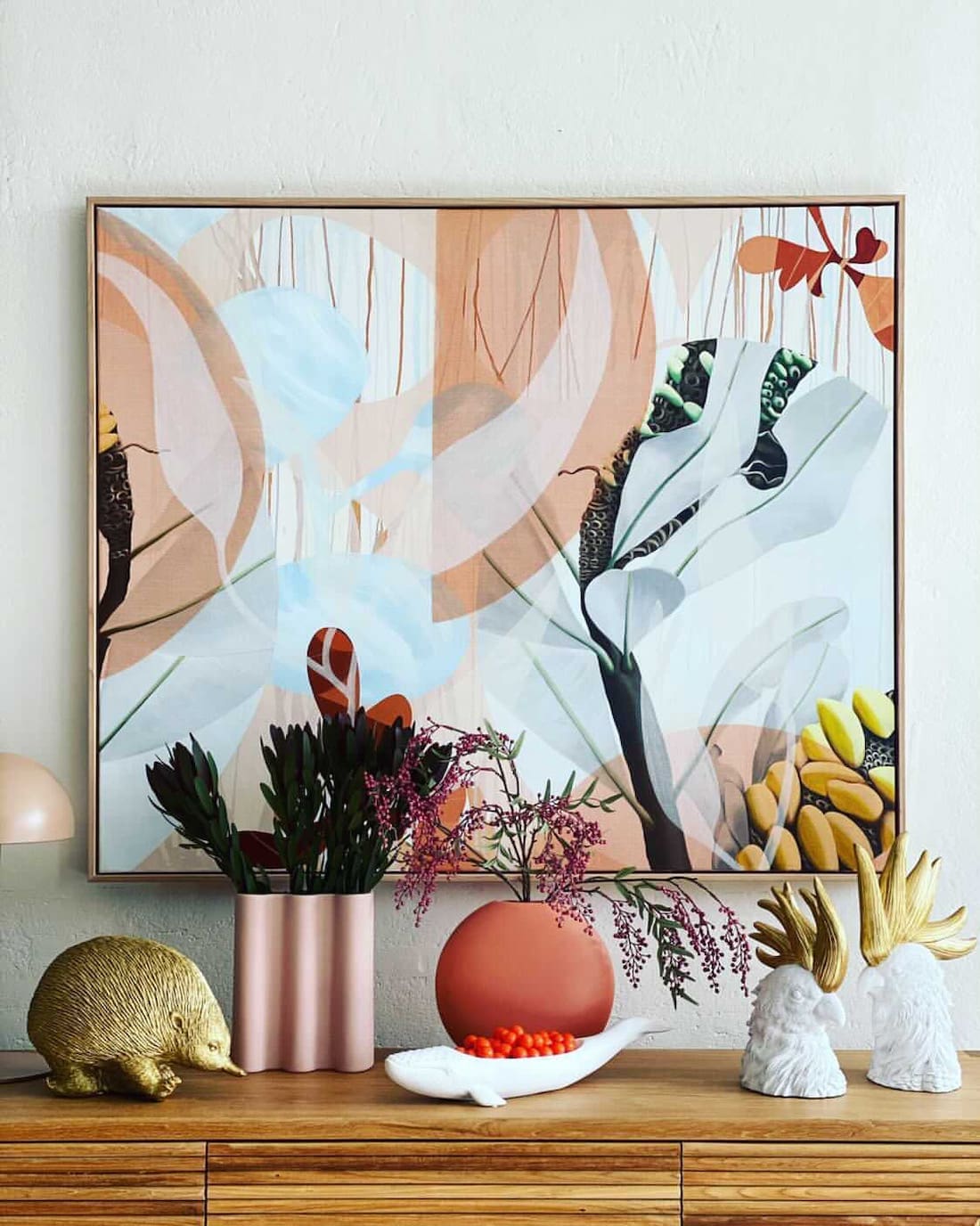 Sarah Leslie artwork above sideboard