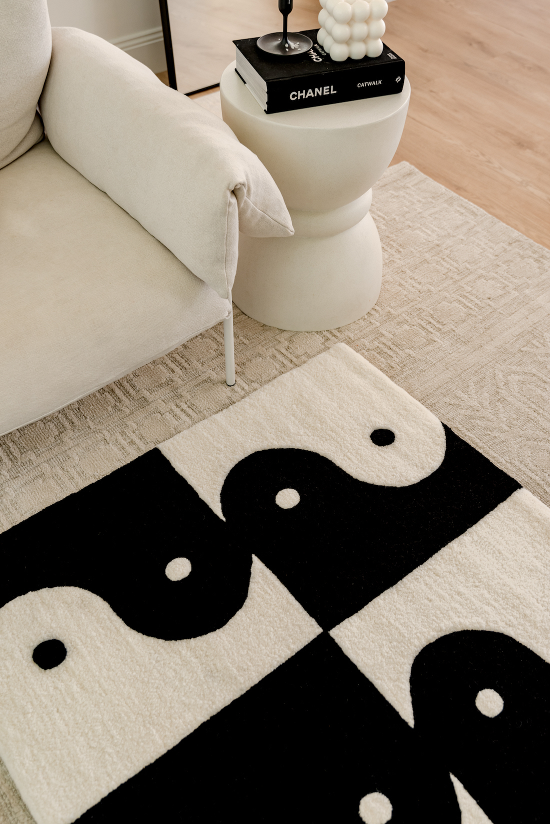 Yin and Yang black and white rug by The Tartan Space