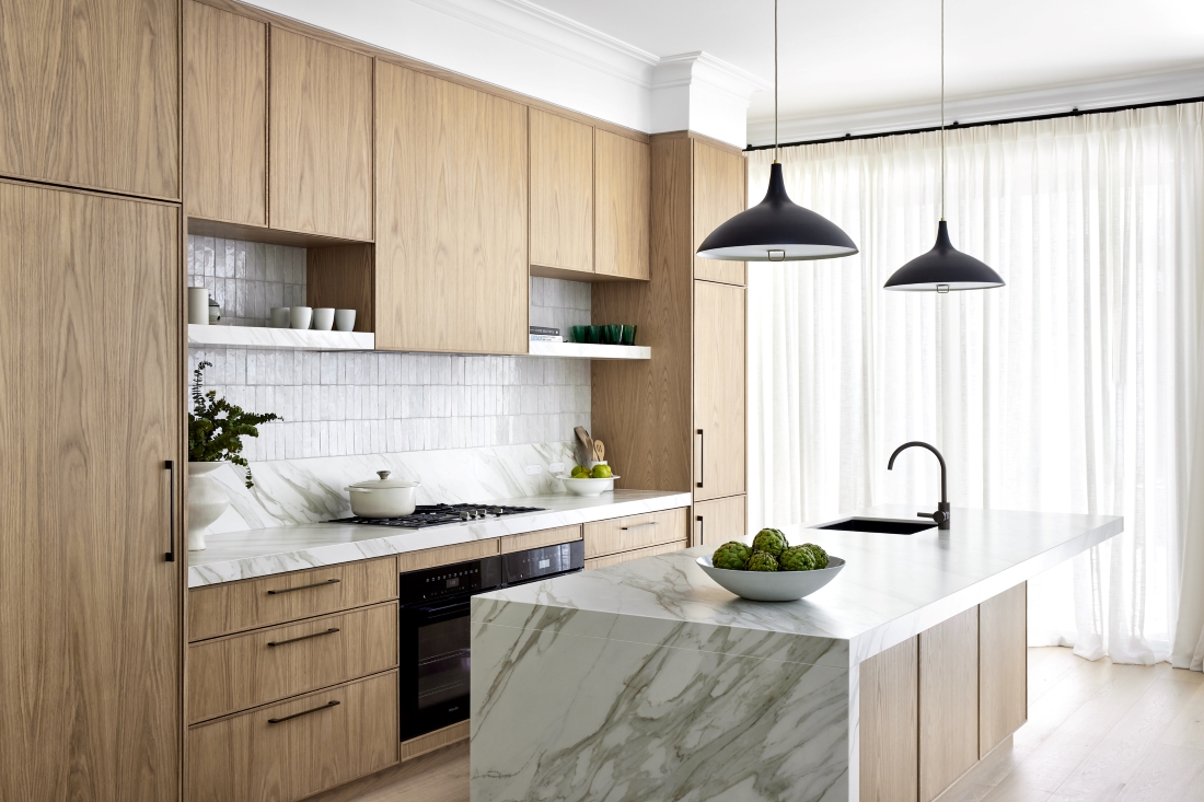 Timber kitchen cabinetry with white tiles