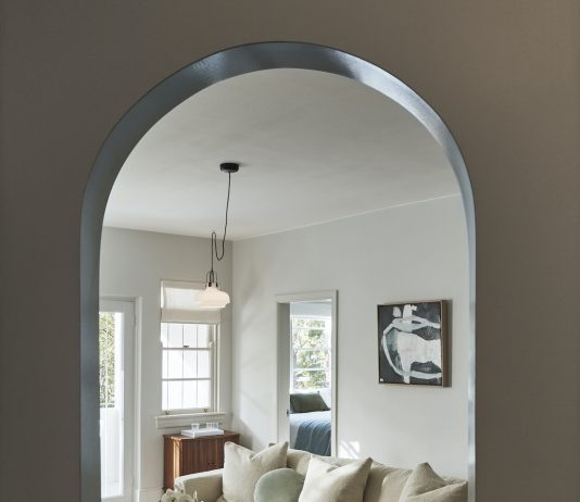 Archway leading into living room