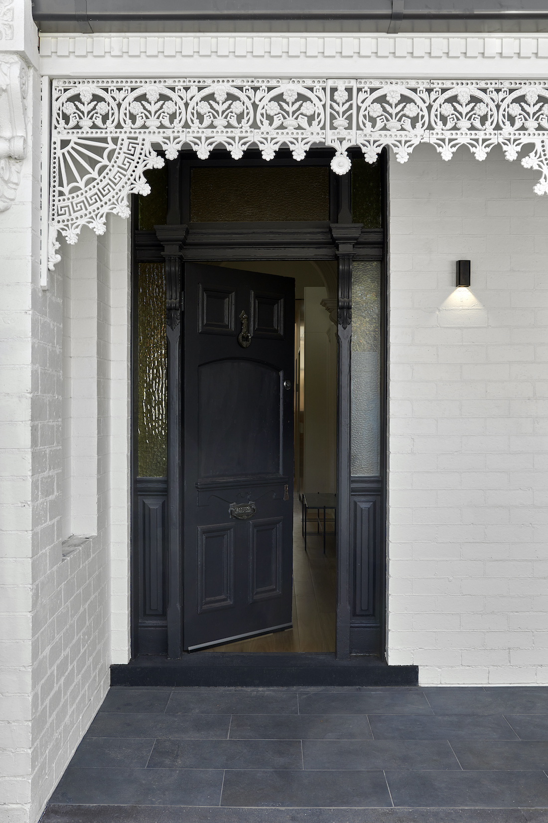 Black front door _ sustainable heritage-listed home renovation