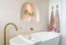 brass tapware and white tub _ earthy coastal bathroom