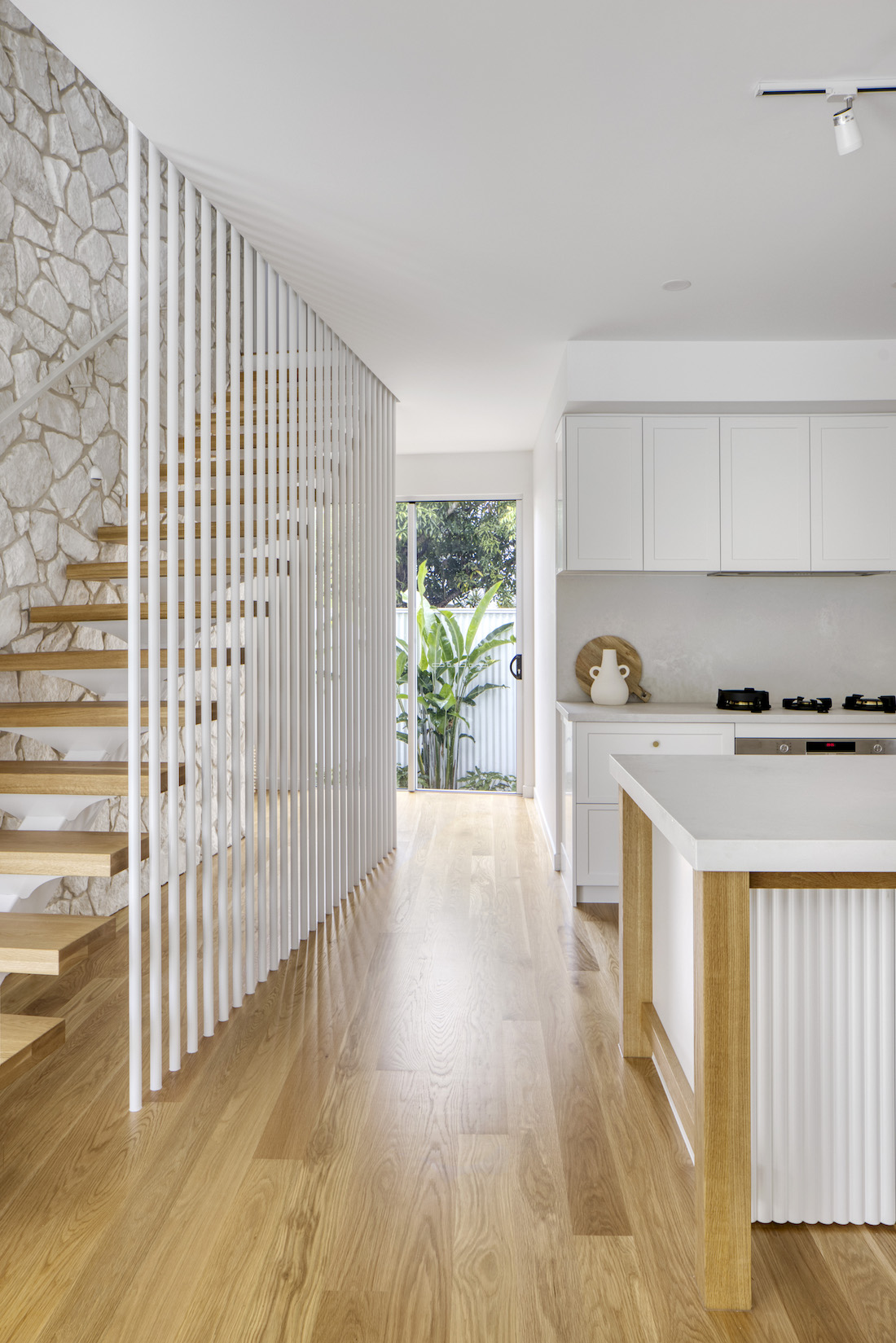 Kitchen and staircase in Tawarri house