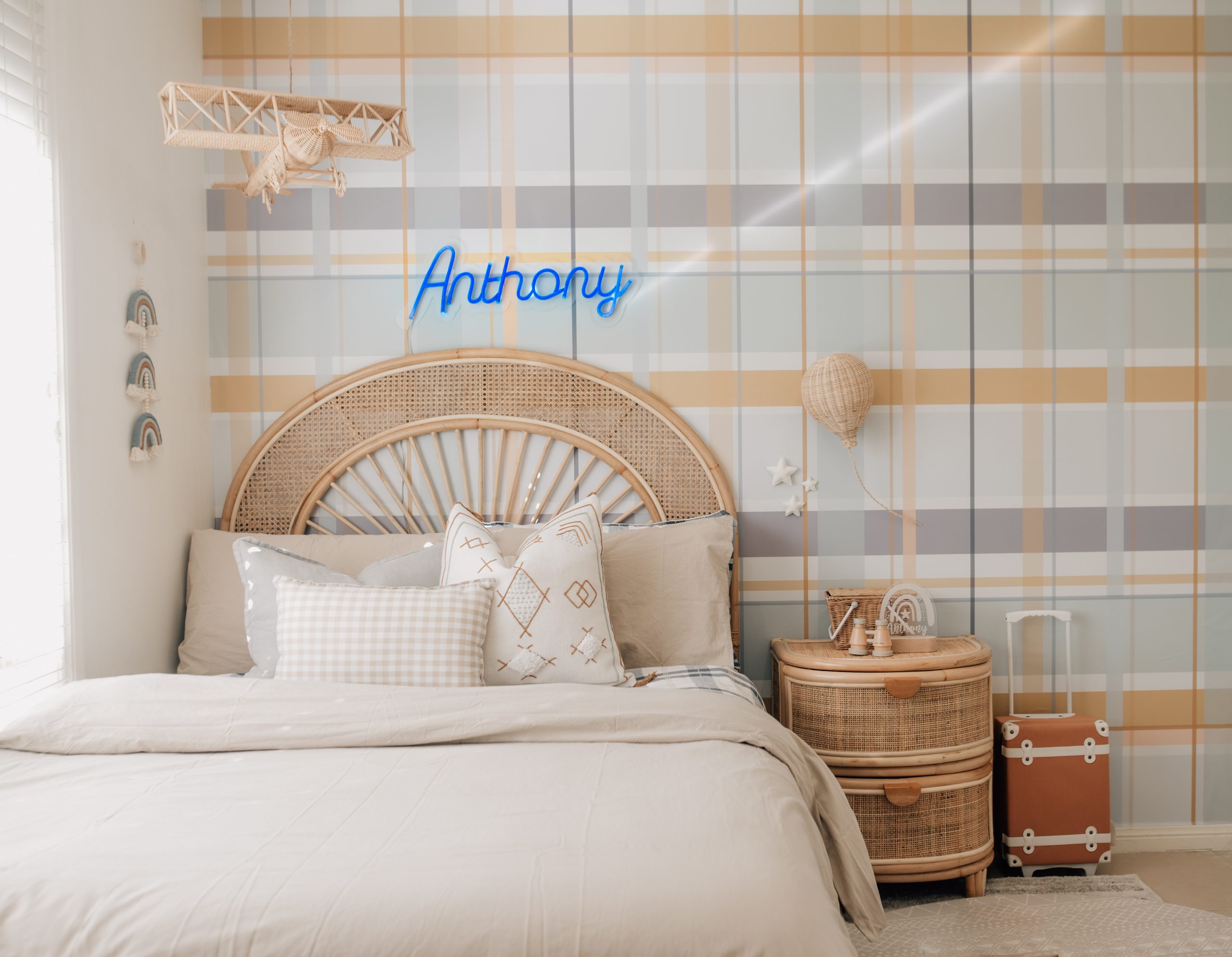 gingham boy's room with neutral bed styling