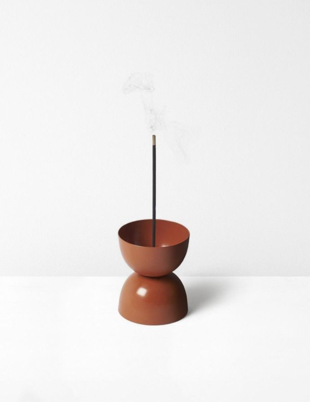 Rust coloured eggcup incense holder