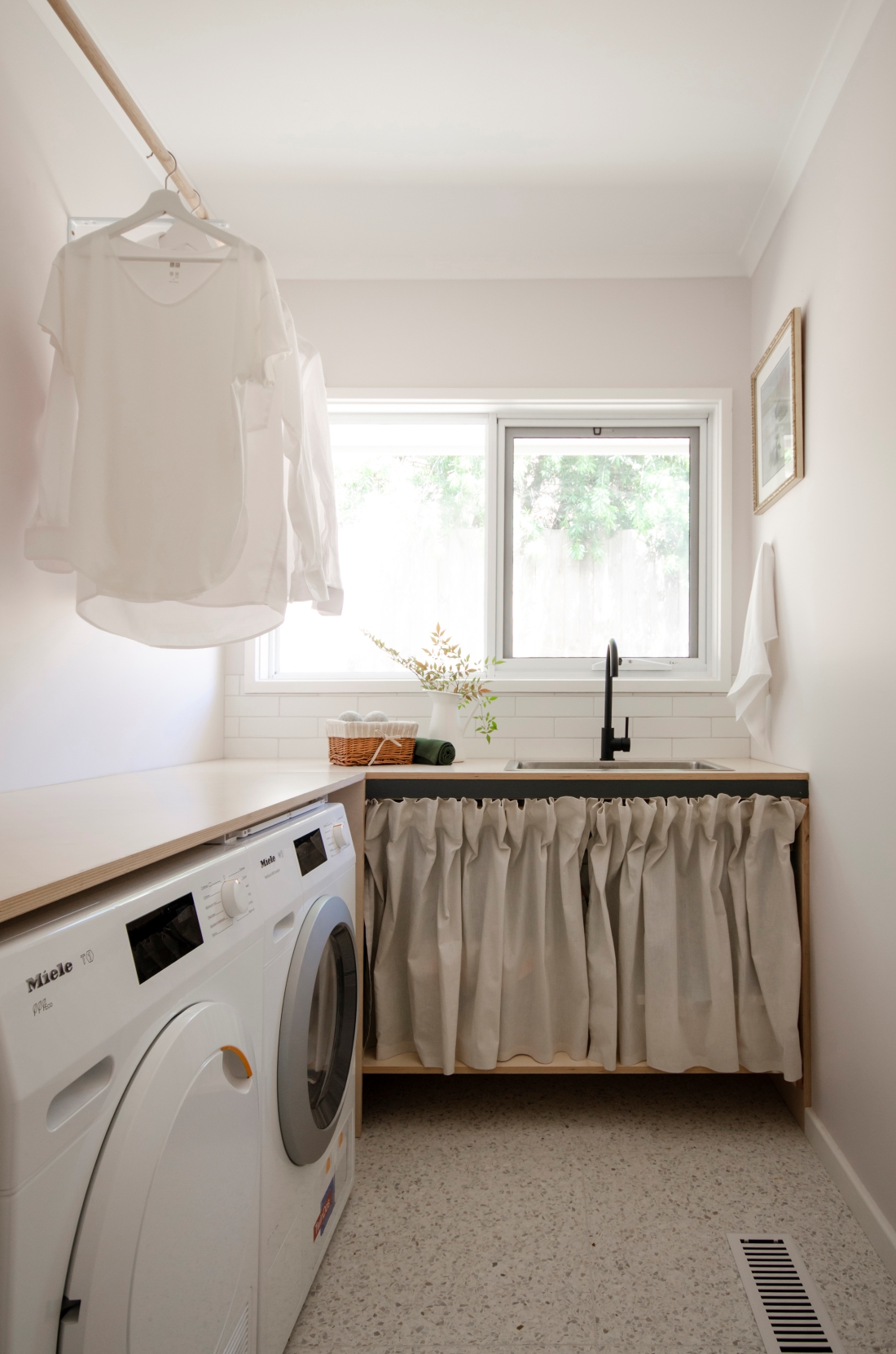 neutral laundry renovation _ affordably update your laundry