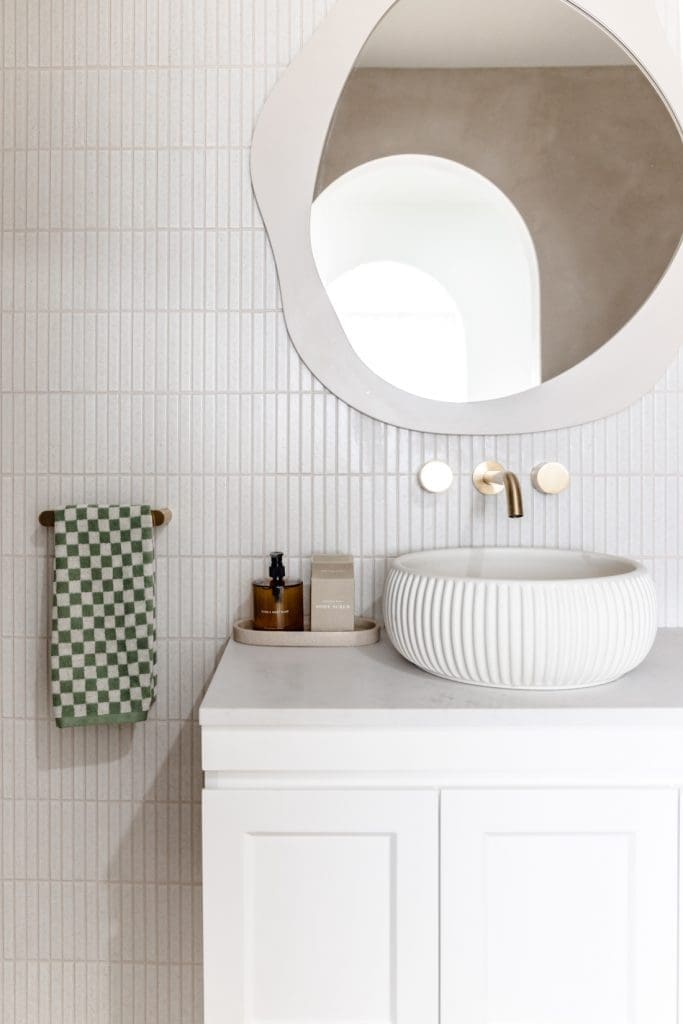 Organic shaped mirror in ensuite